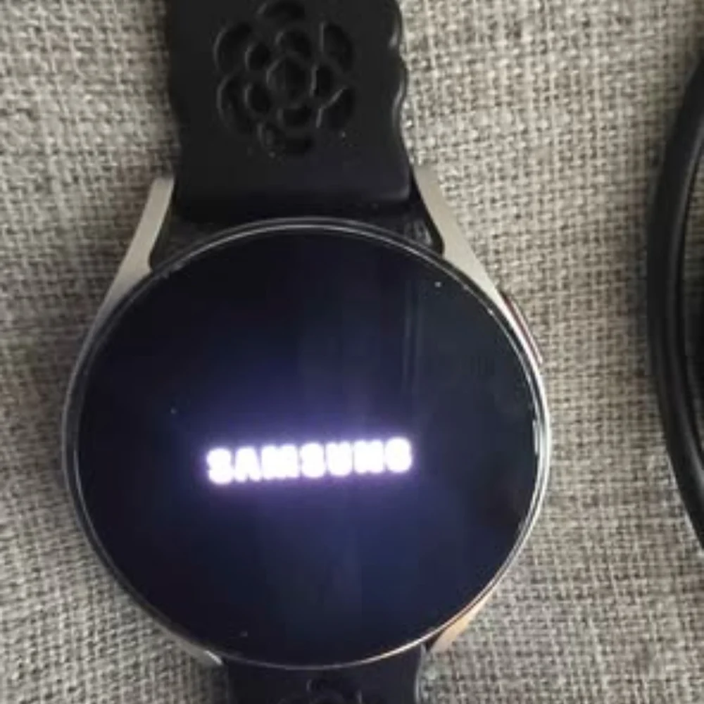 Samsung Smartwatch with Black, Pink, Gray, and Leopard Straps
